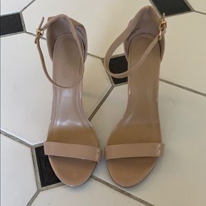 Nude high heels shiny